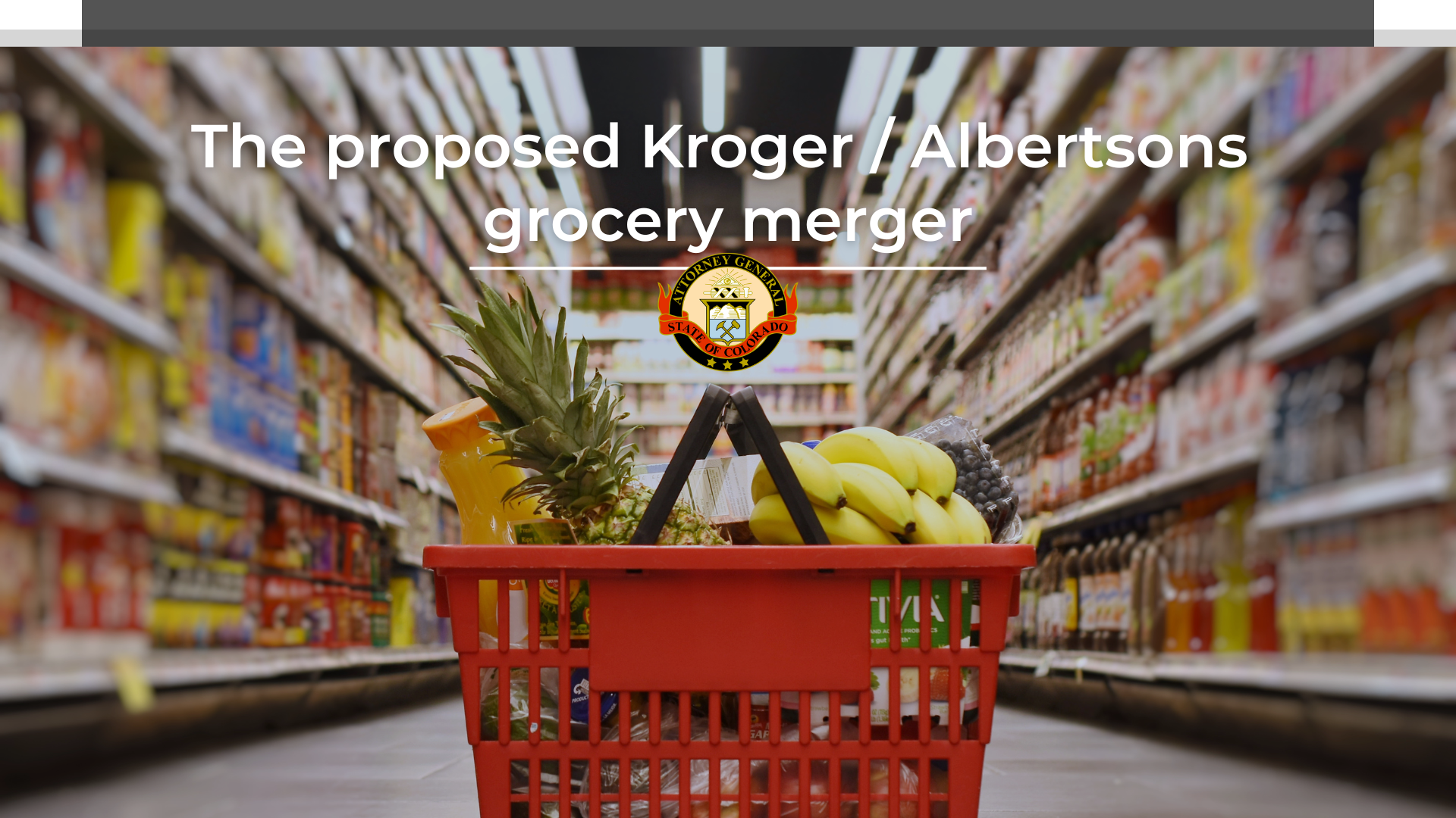 Image of a basket of fruits and grocery items, with a blurred background of the grocery store aisle. The words on the screen read 